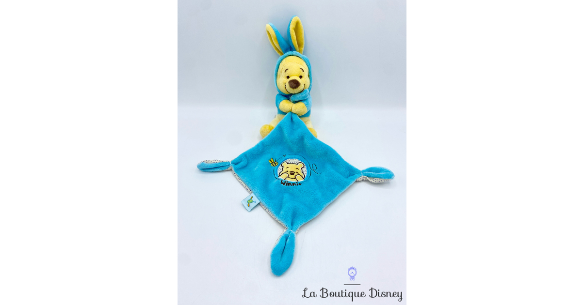 Peluche Doudou Winnie l ourson Lapin Pâques Disney Nicotoy bleu carré